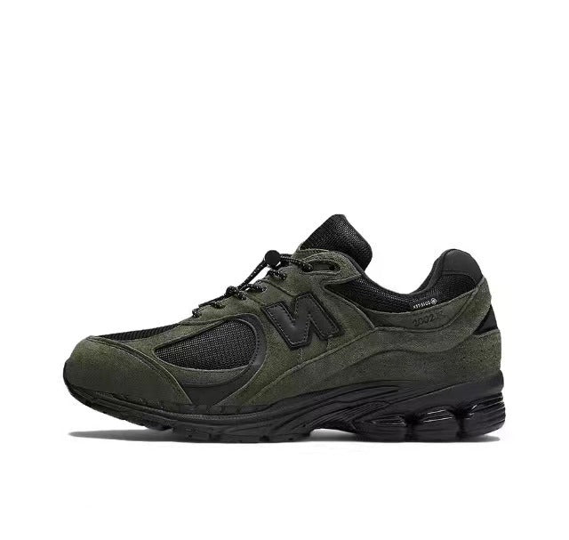 New Balance M2002RXY Sneakers in Olive Green - product image from the listing.