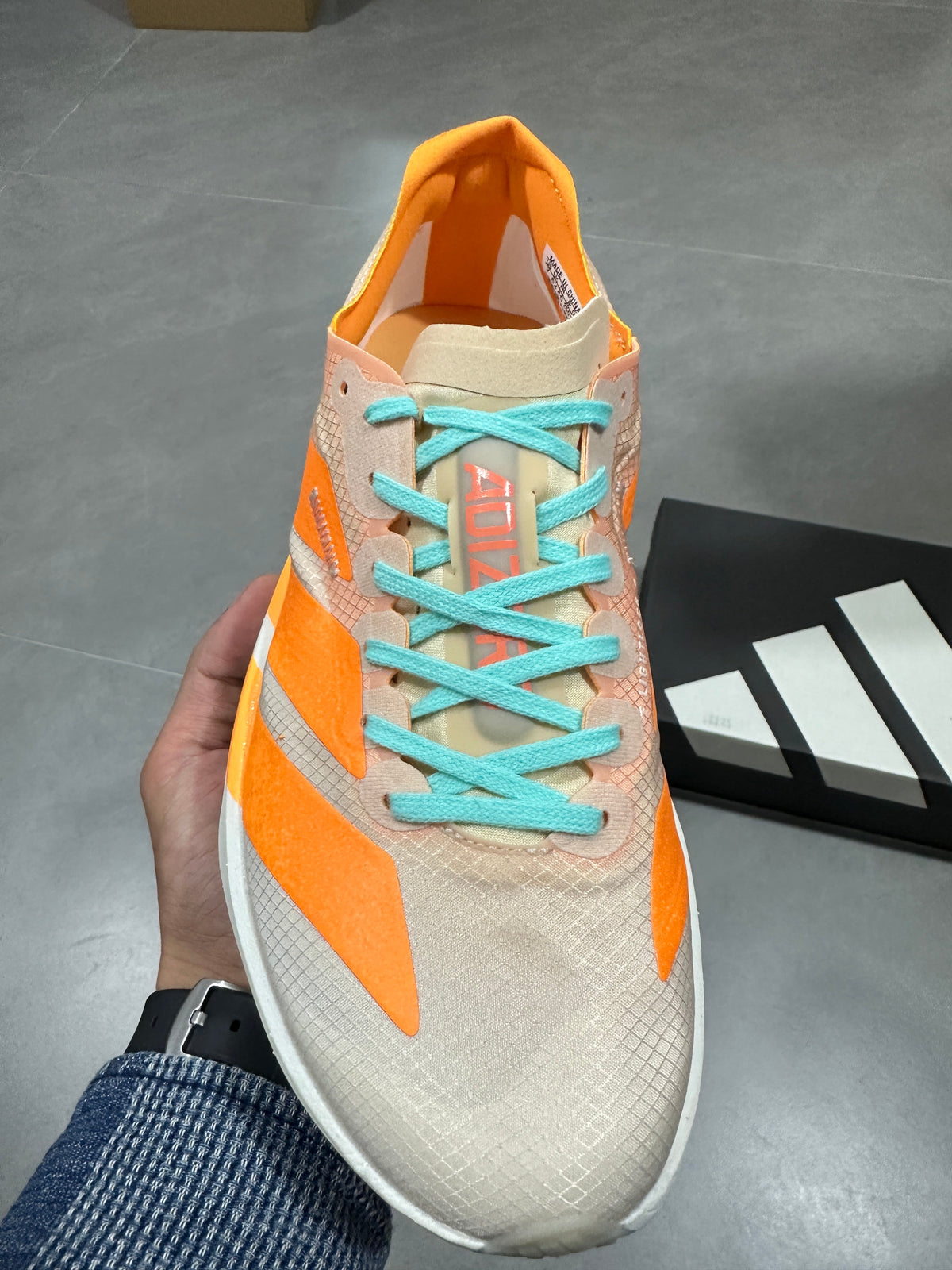 Nike Lightstrike Pro Running Shoes in White Orange Turquoise - product image from the listing.