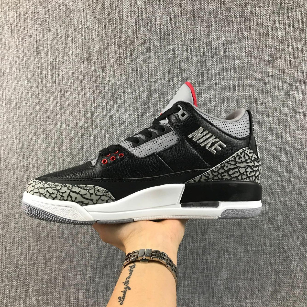 Air Jordan 3 Retro Black Cement Sneakers, in Black and Grey - product image from the listing.
