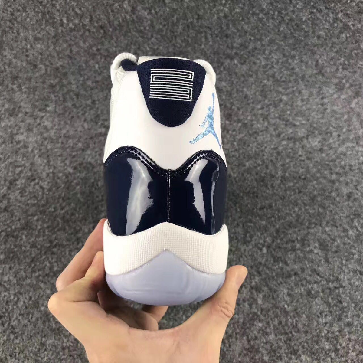 Air Jordan 11 Navy Sneakers - product image from the listing.