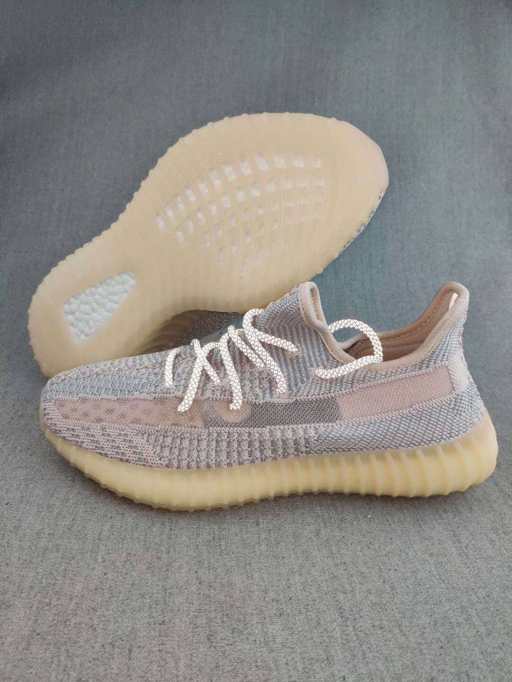 Gray and Cream Yeezy 350 V2 Knit Sneakers - product image from the listing.