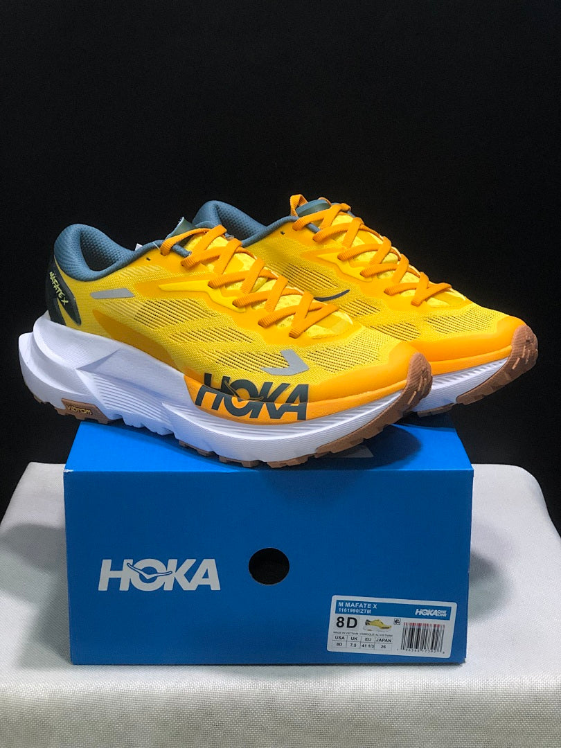 Yellow HOKA Mafate X Trail Running Shoes - product image from the listing.