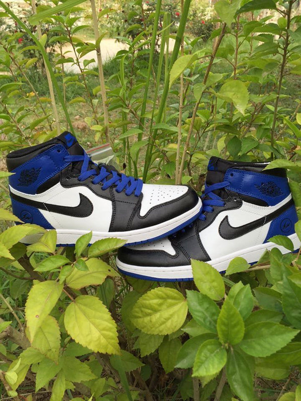 Jordan 1 High Sneakers in Black, in White and Royal Blue - product image from the listing.