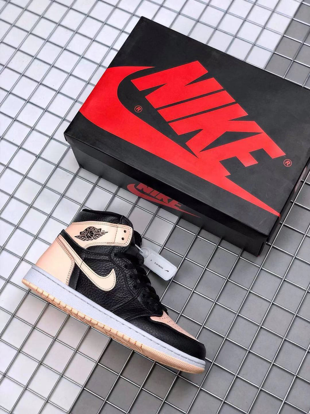 Air Jordan 1 High OG Crimson Tint Sneakers in Black Pink - product image from the listing.