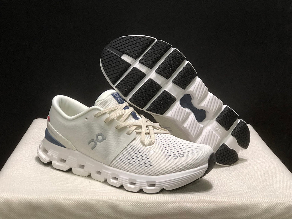 On Cloud X 4 Sneakers in Ivory and Blue - product image from the listing.