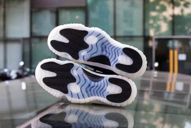 Jordan 11 Retro Low Barons Sneakers in Black White - product image from the listing.