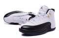 Air Jordan 12 Retro White and Black High-Top Sneakers - product image from the listing.