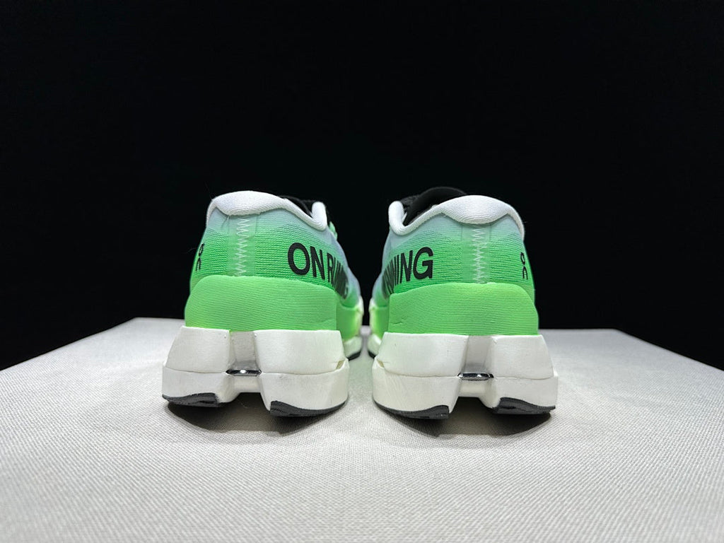 On Cloudboom Max Running Shoes, in White and Green - product image from the listing.