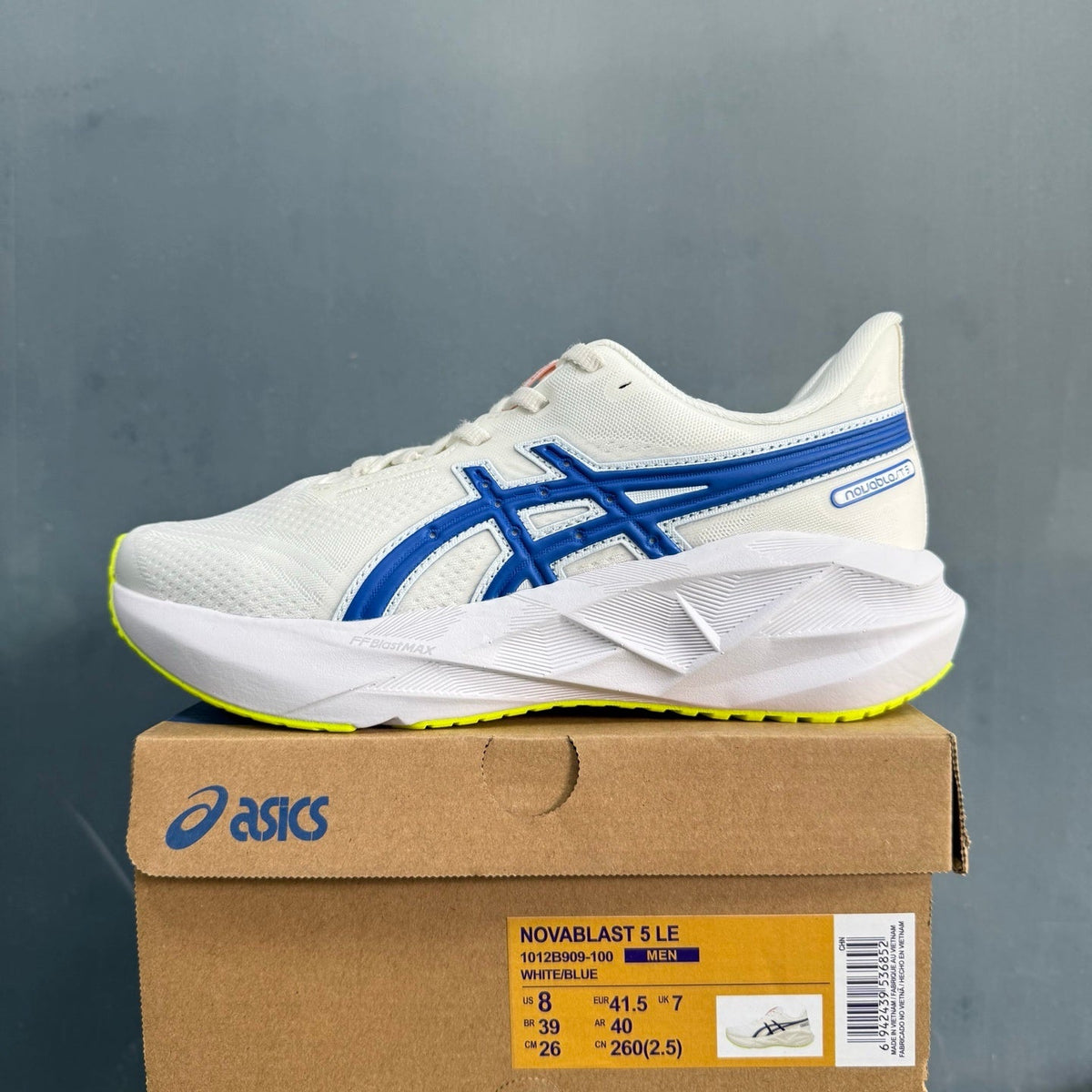 ASICS Novablast 5 LE Running Shoes in White Blue - product image from the listing.