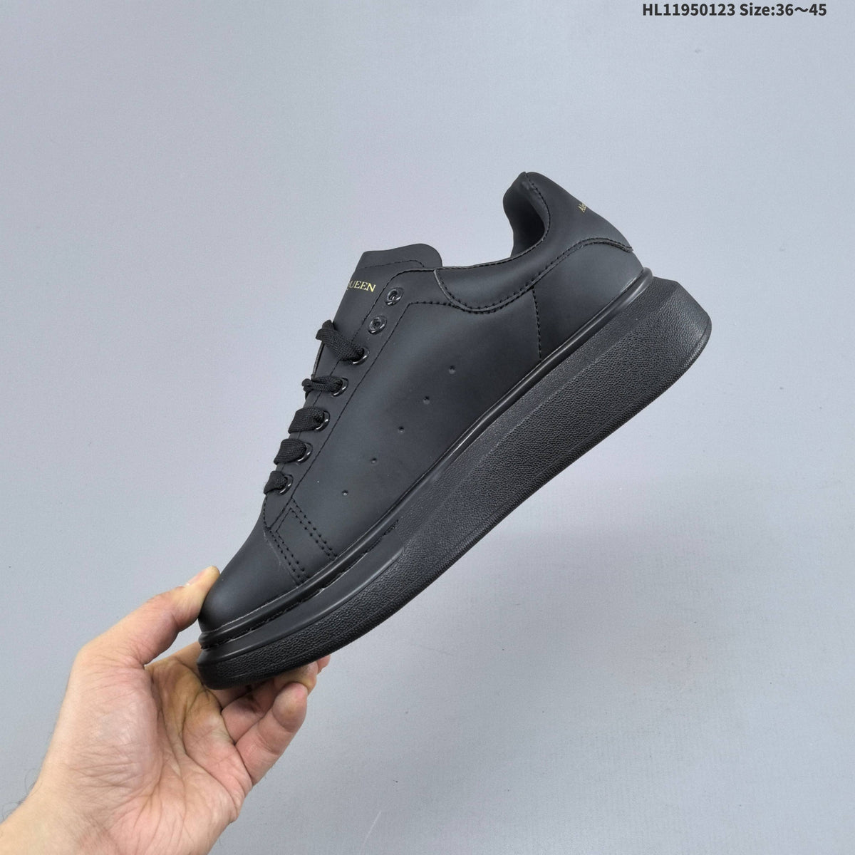 Alexander McQueen Oversized Low-Top Sneakers in Black HL11950123 - product image from the listing.