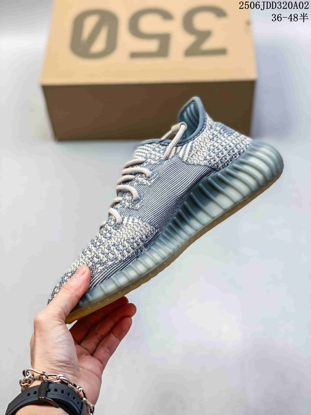 Adidas Yeezy Boost 350 Sneakers in Grey and Tan - product image from the listing.