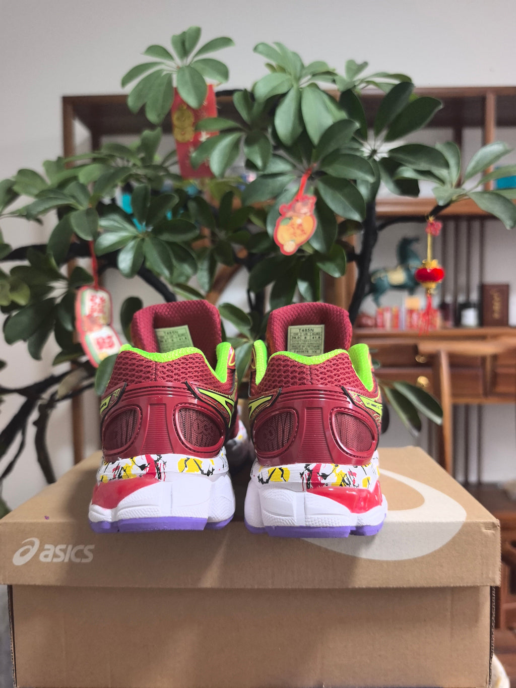 ASICS GEL-NIMBUS 16 Sneakers, in Burgundy and Lime - product image from the listing.