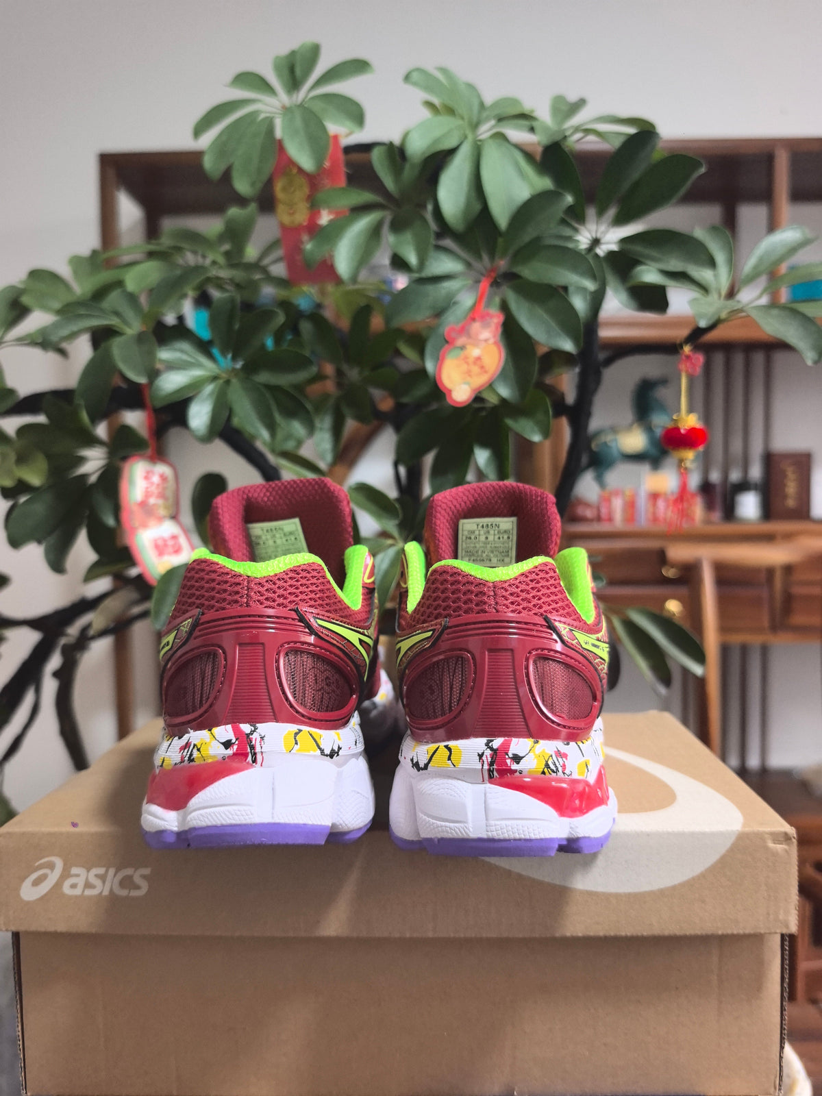ASICS GEL-NIMBUS 16 Sneakers, in Burgundy and Lime - product image from the listing.