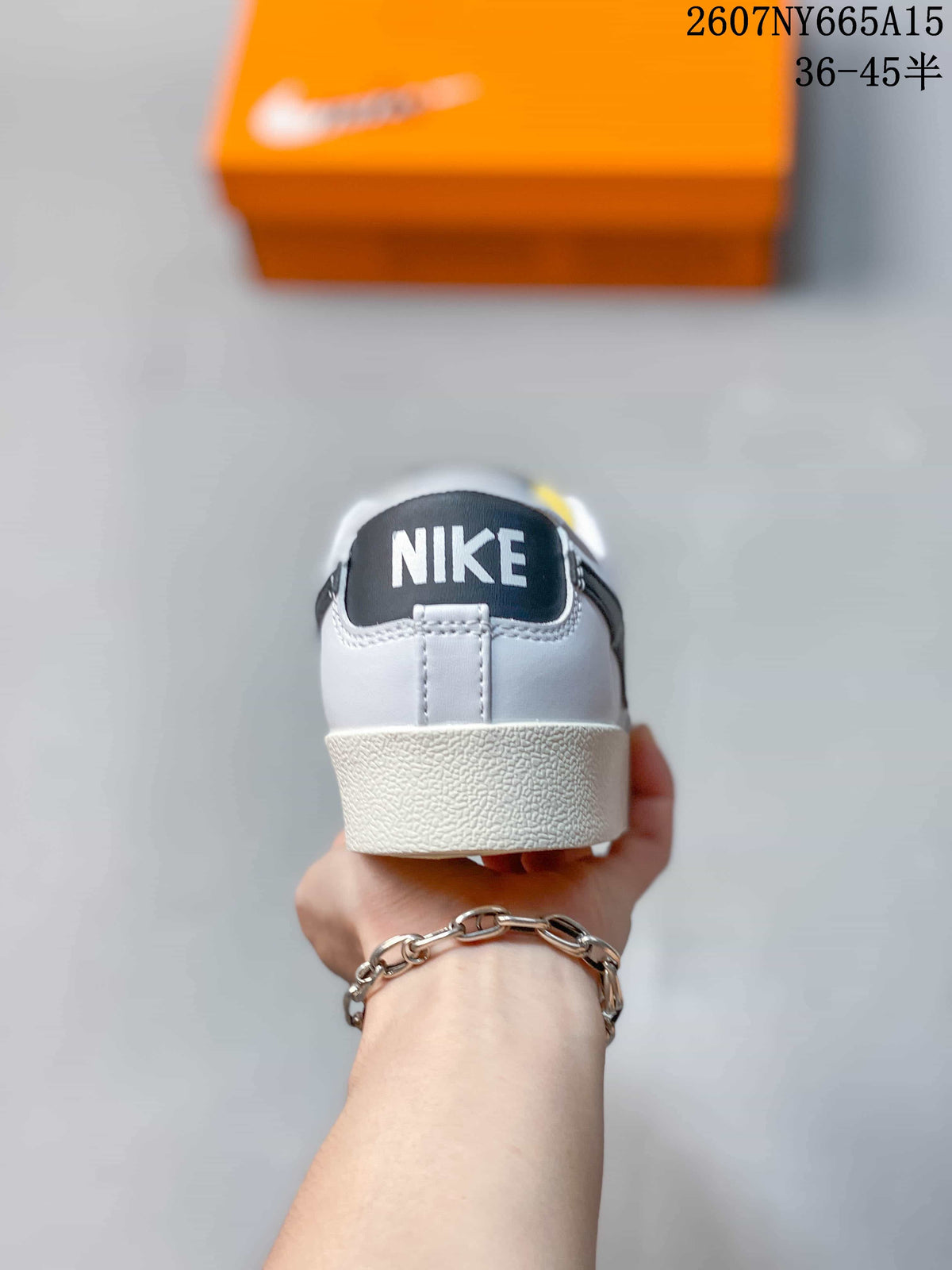 Nike Blazer Low Premium Sneakers in White Black CI9888-001 - product image from the listing.