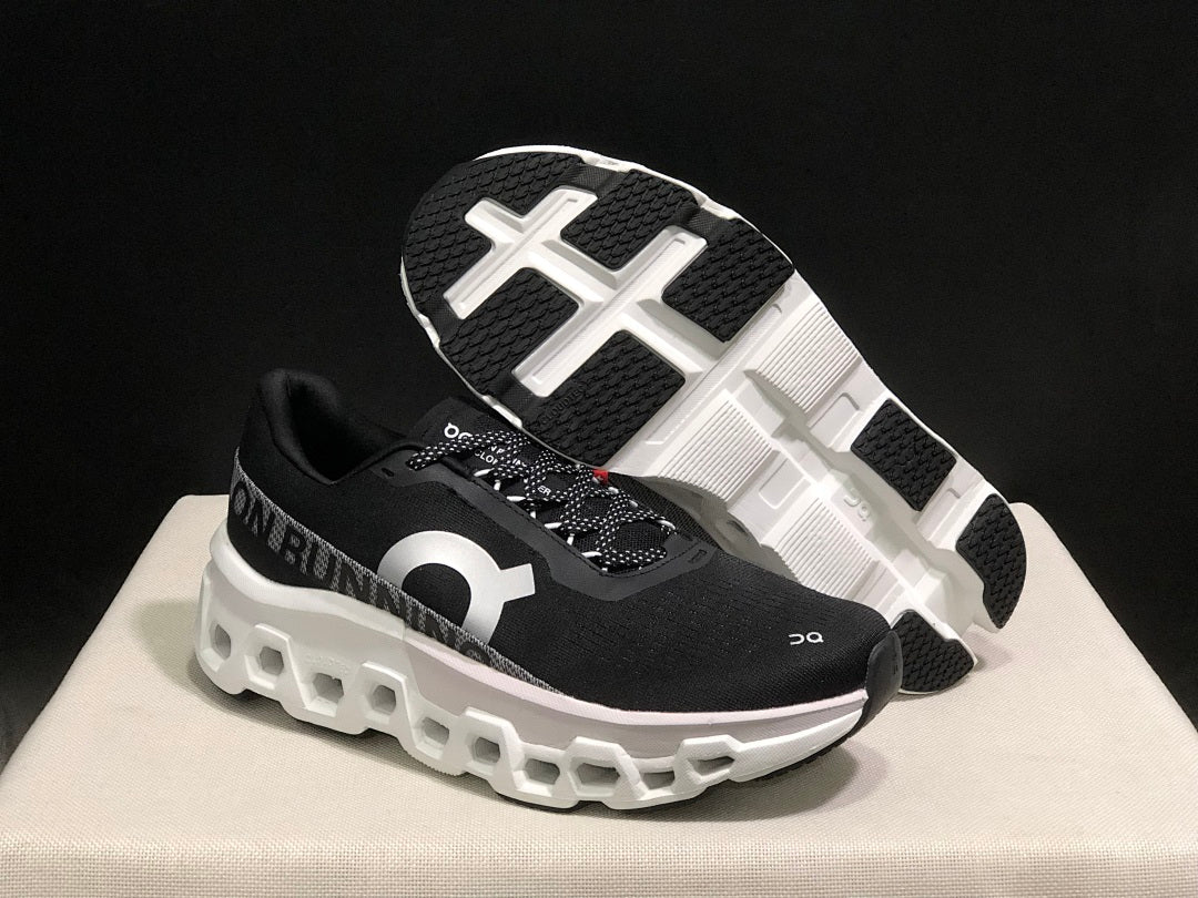 On Cloudmonster 2 Running Shoes in Black White - product image from the listing.