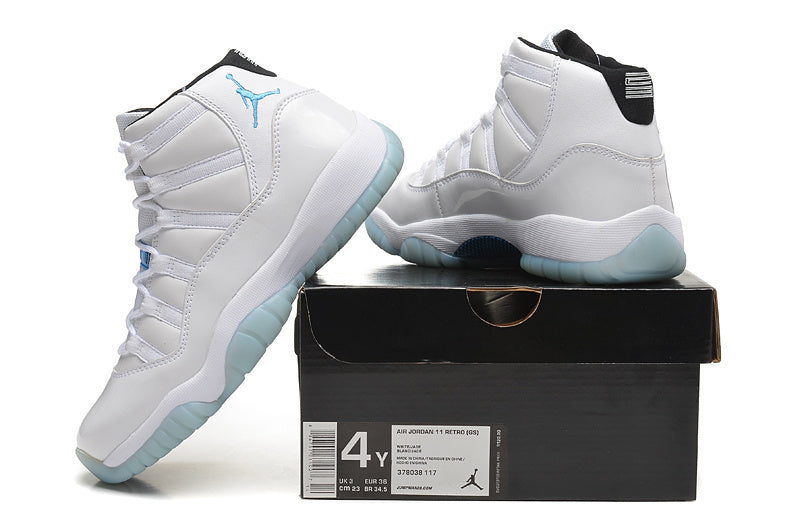 Air Jordan 11 Retro High-Top Sneakers in White and Blue - product image from the listing.