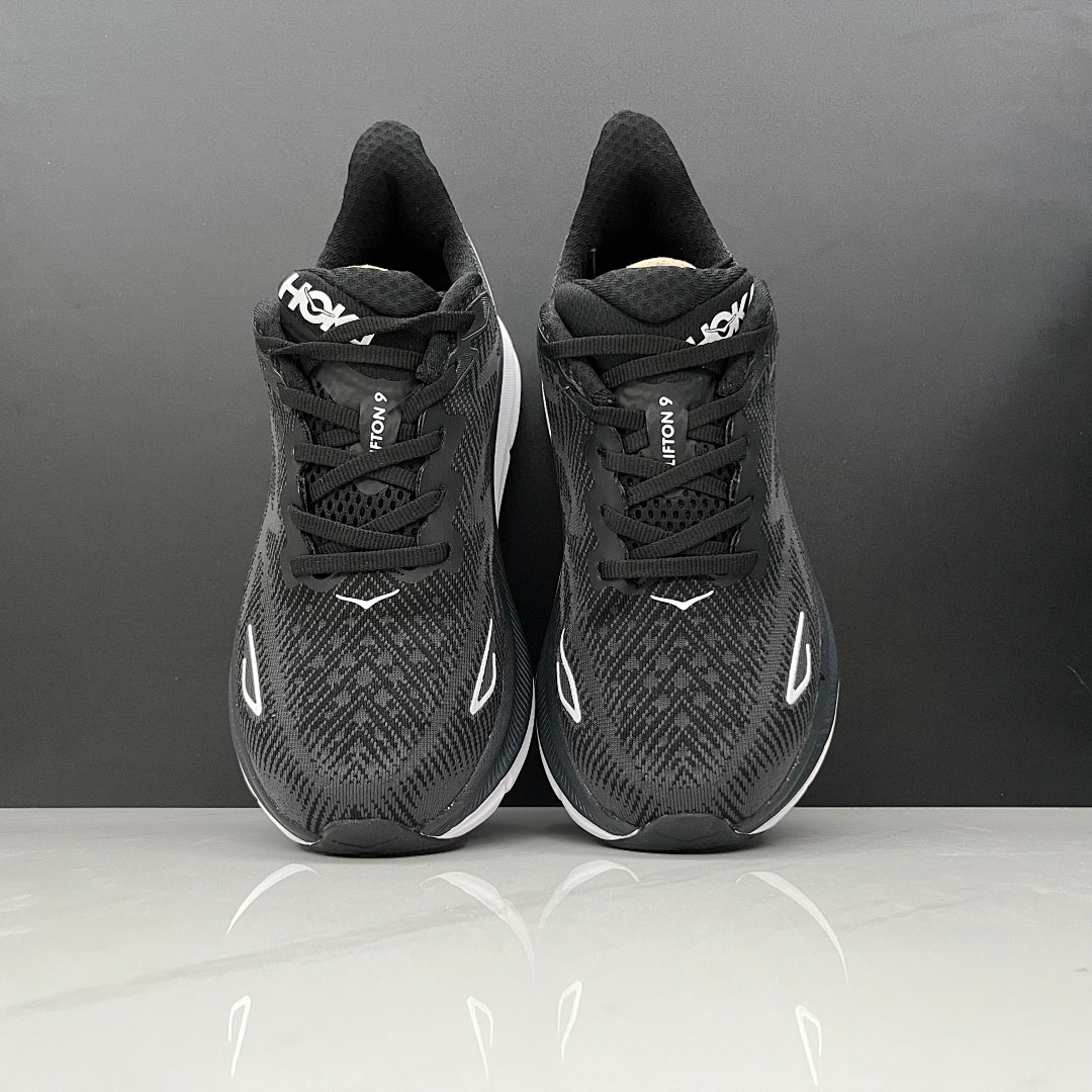 HOKA Clifton 9 Running Shoes in Black and White - product image from the listing.