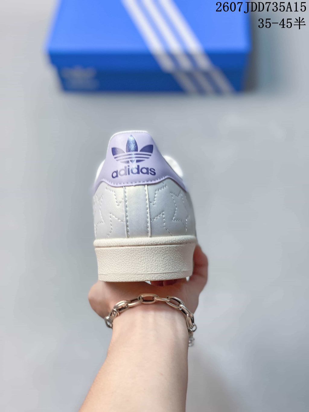 adidas Superstar White and Lavender Shell-Toe Trainers - product image from the listing.