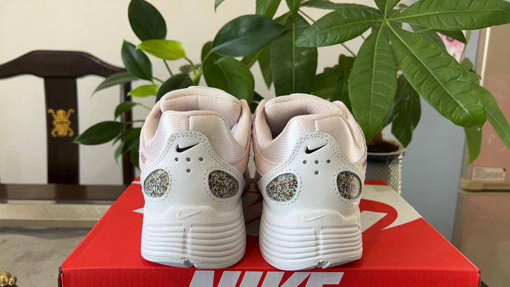 Nike P-6000 Sneakers in White and Pink CJ9585-600 - product image from the listing.