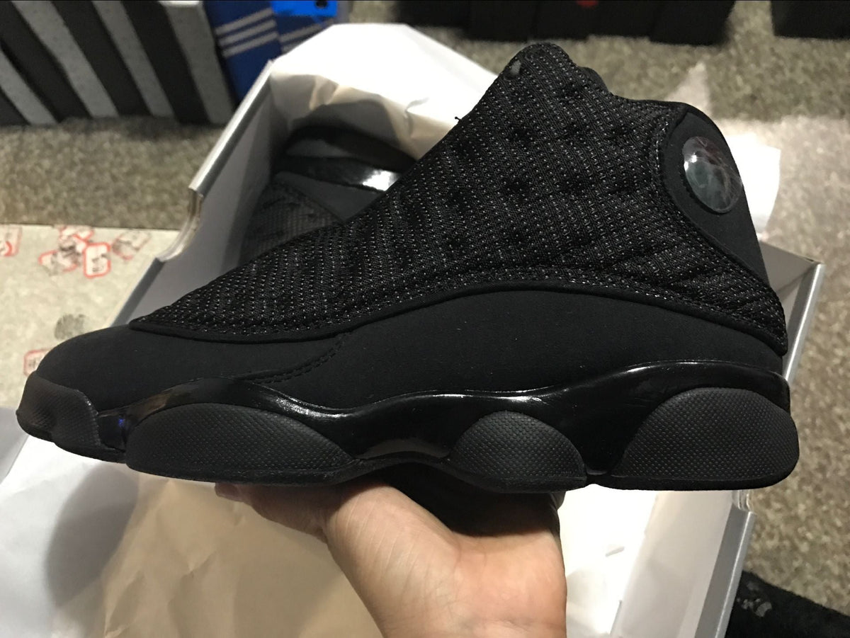 Air Jordan 13 Retro Black Cat Basketball Sneakers in Black - product image from the listing.