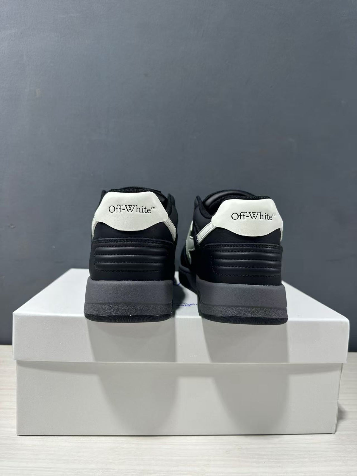 Off-White Out Of Office Low-Top Sneakers in Black White OWIA189C99LEA0061001 - product image from the listing.