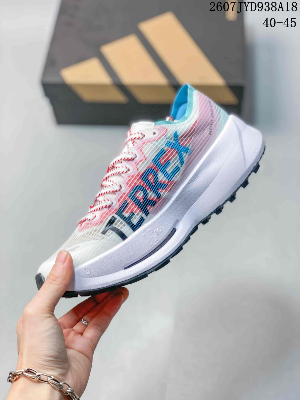 Adidas Adizero Evo SL 2 Running Shoes in White Pink Blue - product image from the listing.