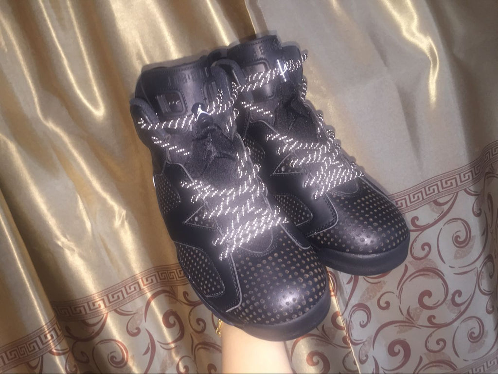 Jordan 6 Retro Black Cat High-Top Sneakers in Black and White - product image from the listing.