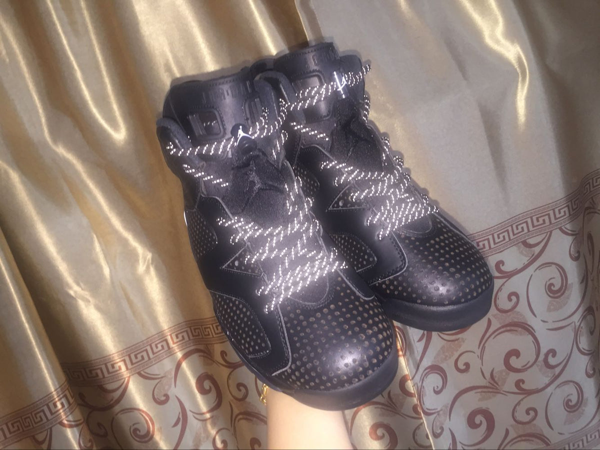 Jordan 6 Retro Black Cat High-Top Sneakers in Black and White - product image from the listing.