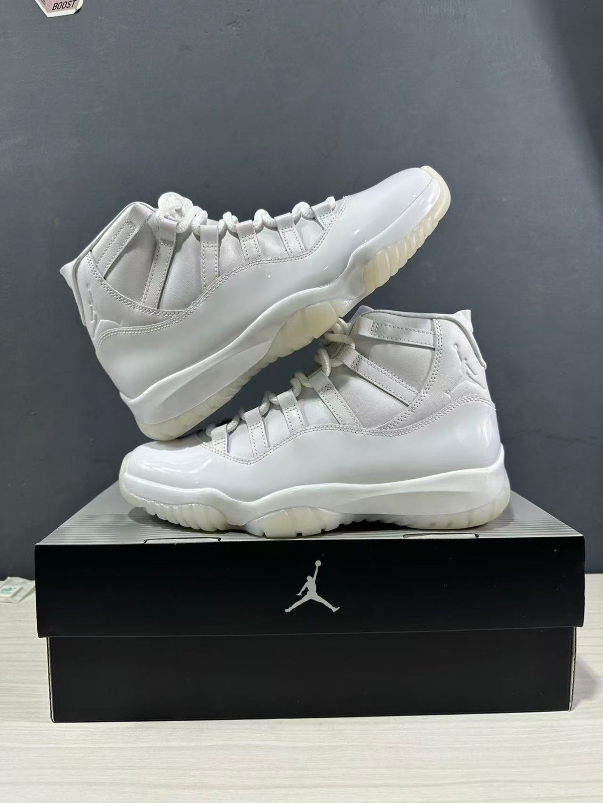 Air Jordan 11 Comme des Garçons White Sneakers IV7639-100 - product image from the listing.
