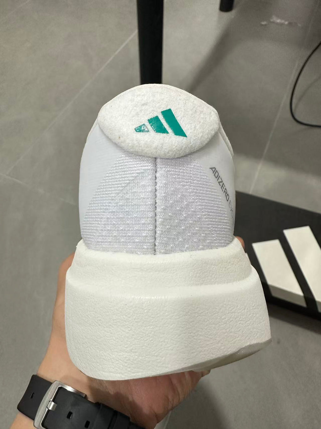 adidas Lightstrike Pro Running Shoes in White and Teal JR4451 - product image from the listing.