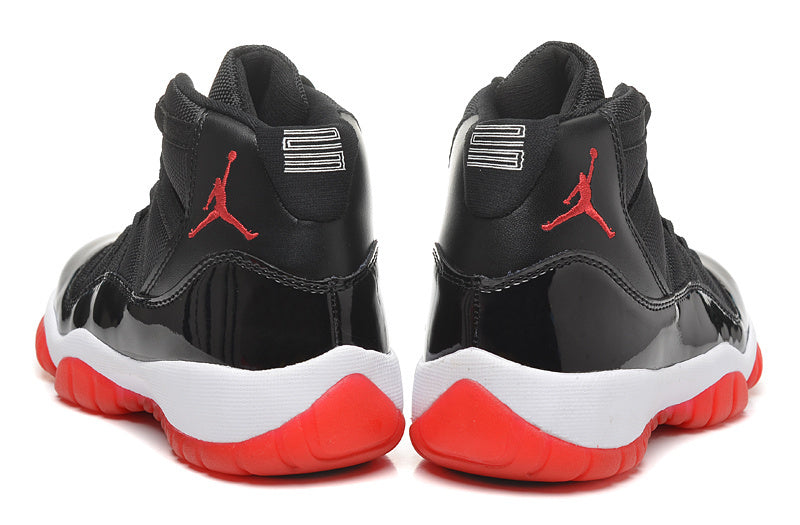 Air Jordan 11 Retro High Basketball Sneakers in Black Red - product image from the listing.