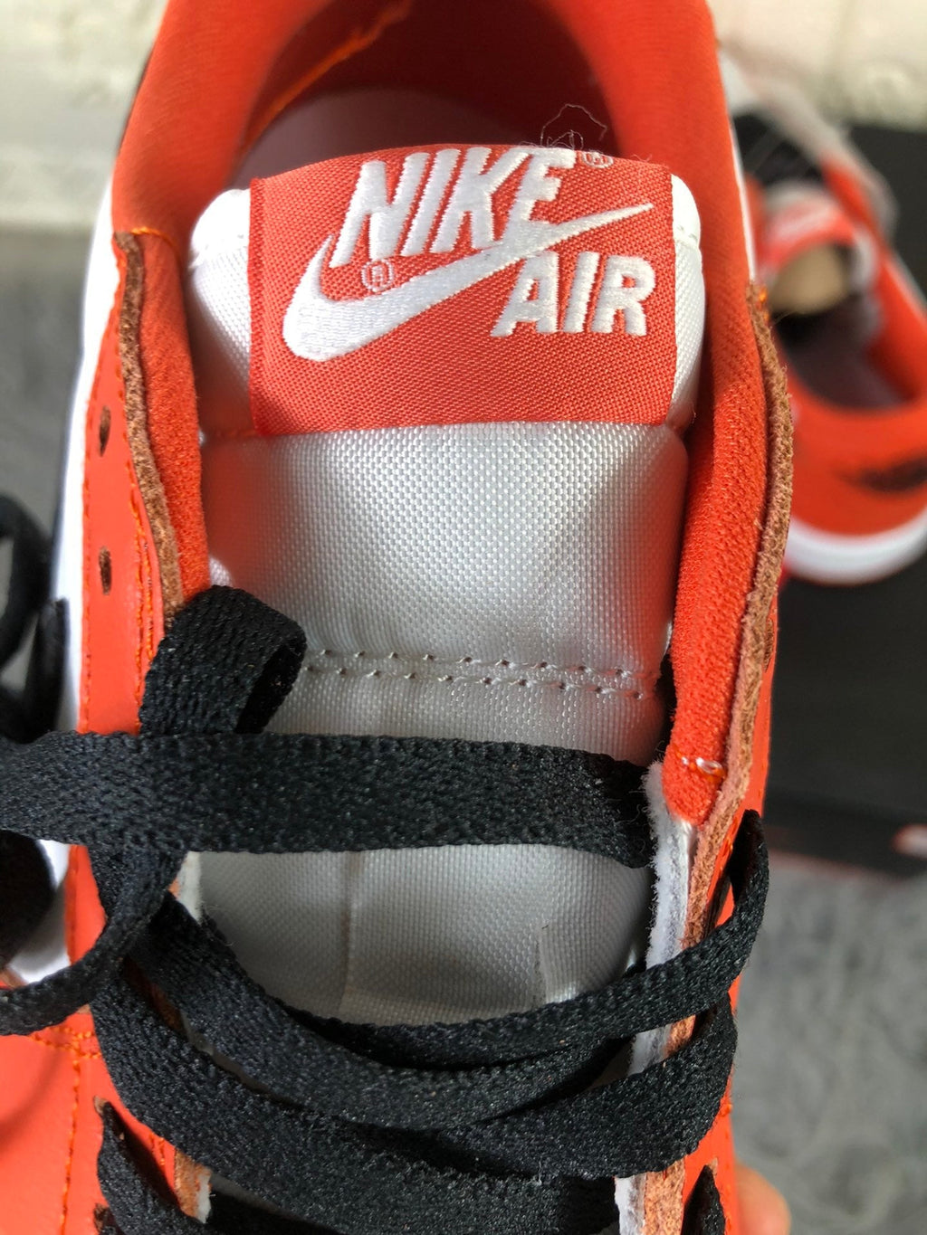 Nike Air Jordan 1 Low Sneakers in White Orange CZ0790-801 - product image from the listing.