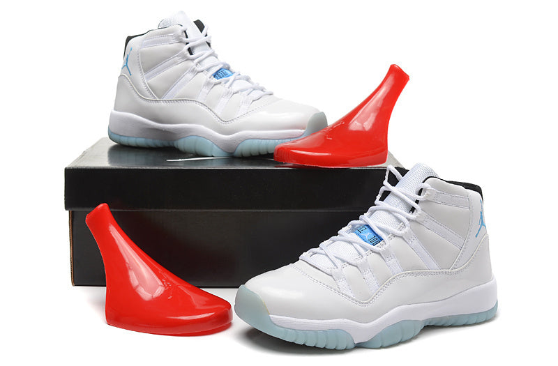 Air Jordan 11 Retro High-Top Sneakers in White and Blue - product image from the listing.