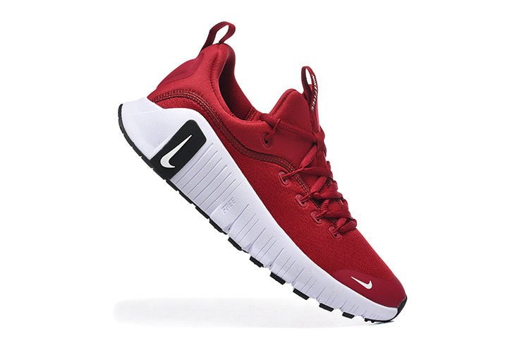 Nike Free Low-Top Sneakers in Red - product image from the listing.