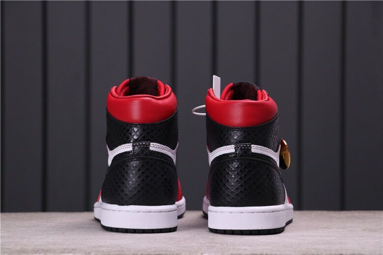 Women's Air Jordan 1 Satin Snake High-Top Sneakers CD0461-601 - product image from the listing.