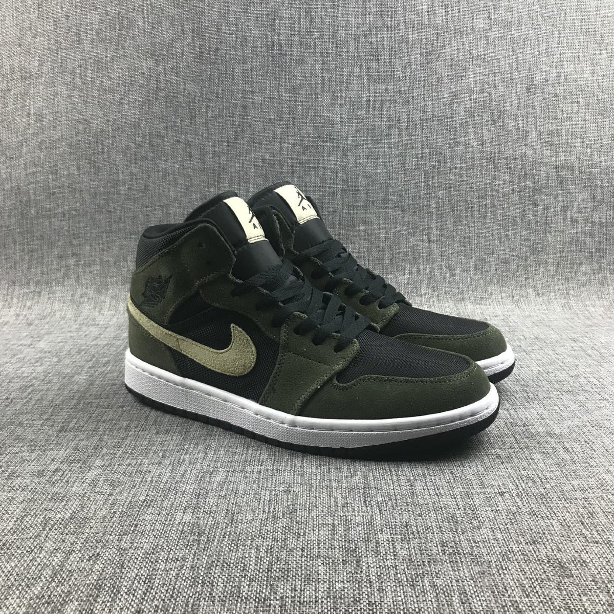 Air Jordan 1 Mid Sneakers in Olive Green BQ6472-030 - product image from the listing.