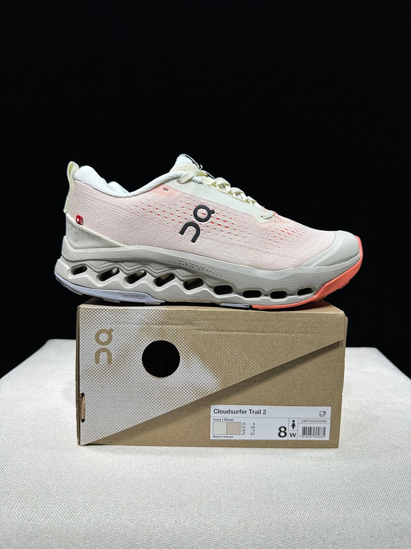 On Cloudsurfer Trail 2 Trail Running Shoes, in Ivory and Coral - product image from the listing.