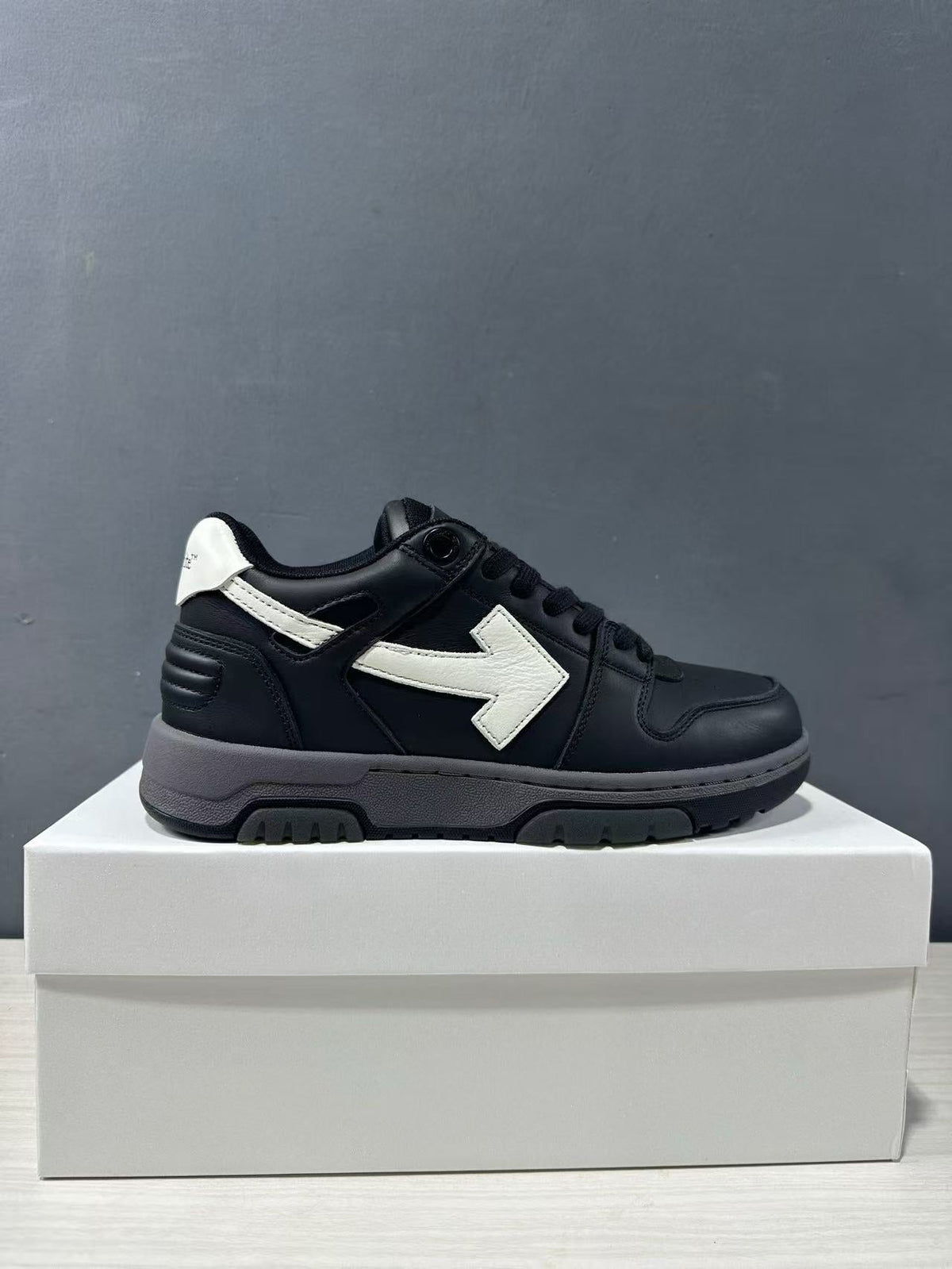 Off-White Out Of Office Low-Top Sneakers in Black White OWIA189C99LEA0061001 - product image from the listing.
