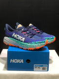 HOKA Speedgoat 6 Trail Running Shoes, in Blue and Teal - product image from the listing.