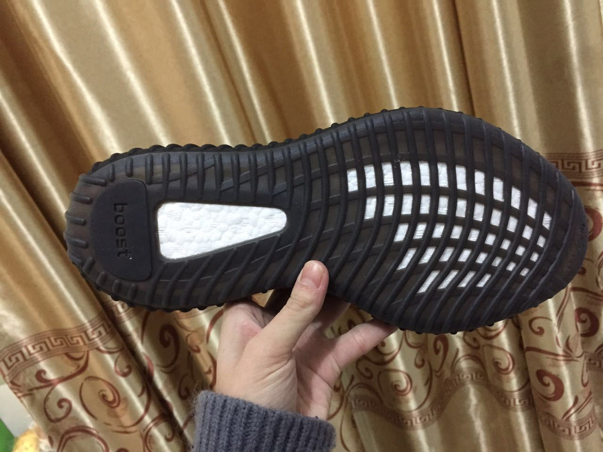 Adidas Yeezy Boost 350 V2 Sneakers in Black White - product image from the listing.