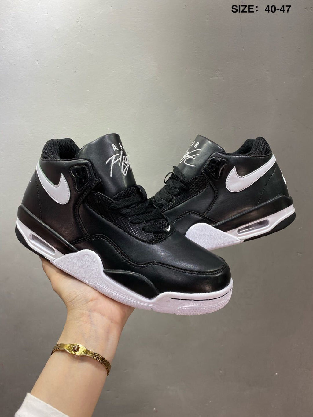 Nike Air Flight 89 Sneakers in Black and White - product image from the listing.