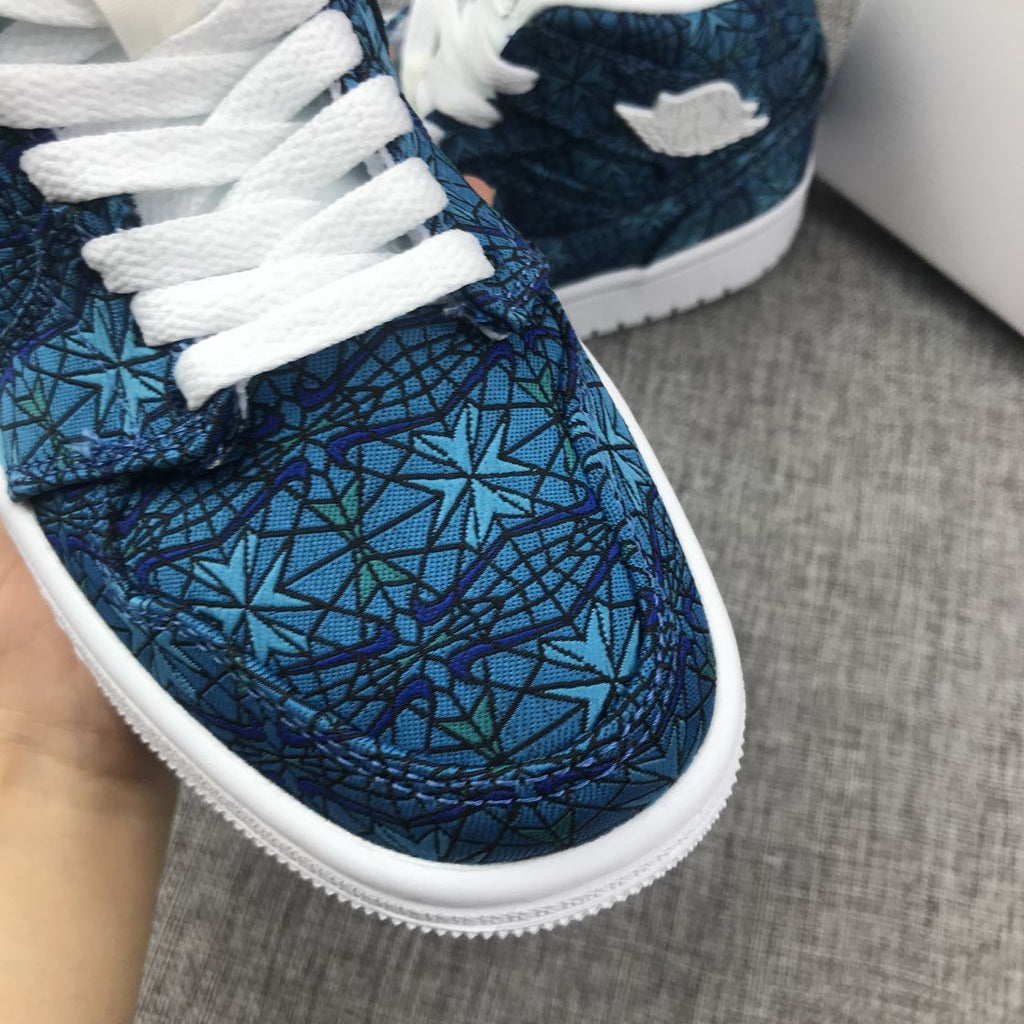 Women's Air Jordan 1 Mid Blue Pattern Sneakers AH7389-300 - product image from the listing.