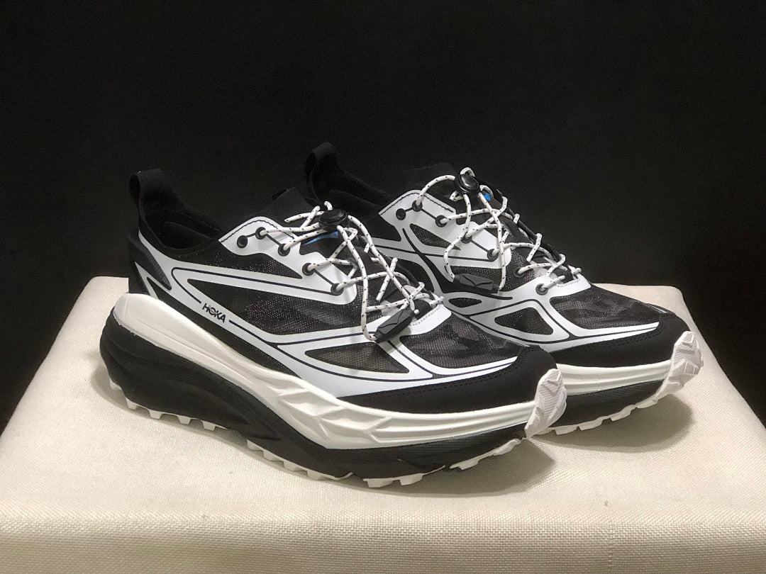 HOKA Stinson One 7 Black and White Trail Trainers - product image from the listing.