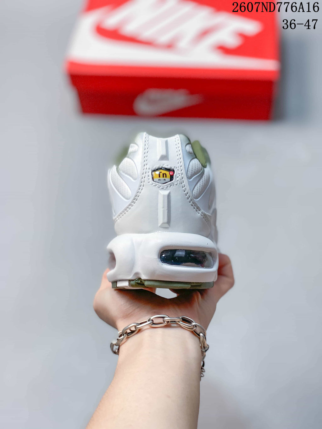 Nike Air Max Plus Sneakers in White and Green 2607ND776A16 - product image from the listing.