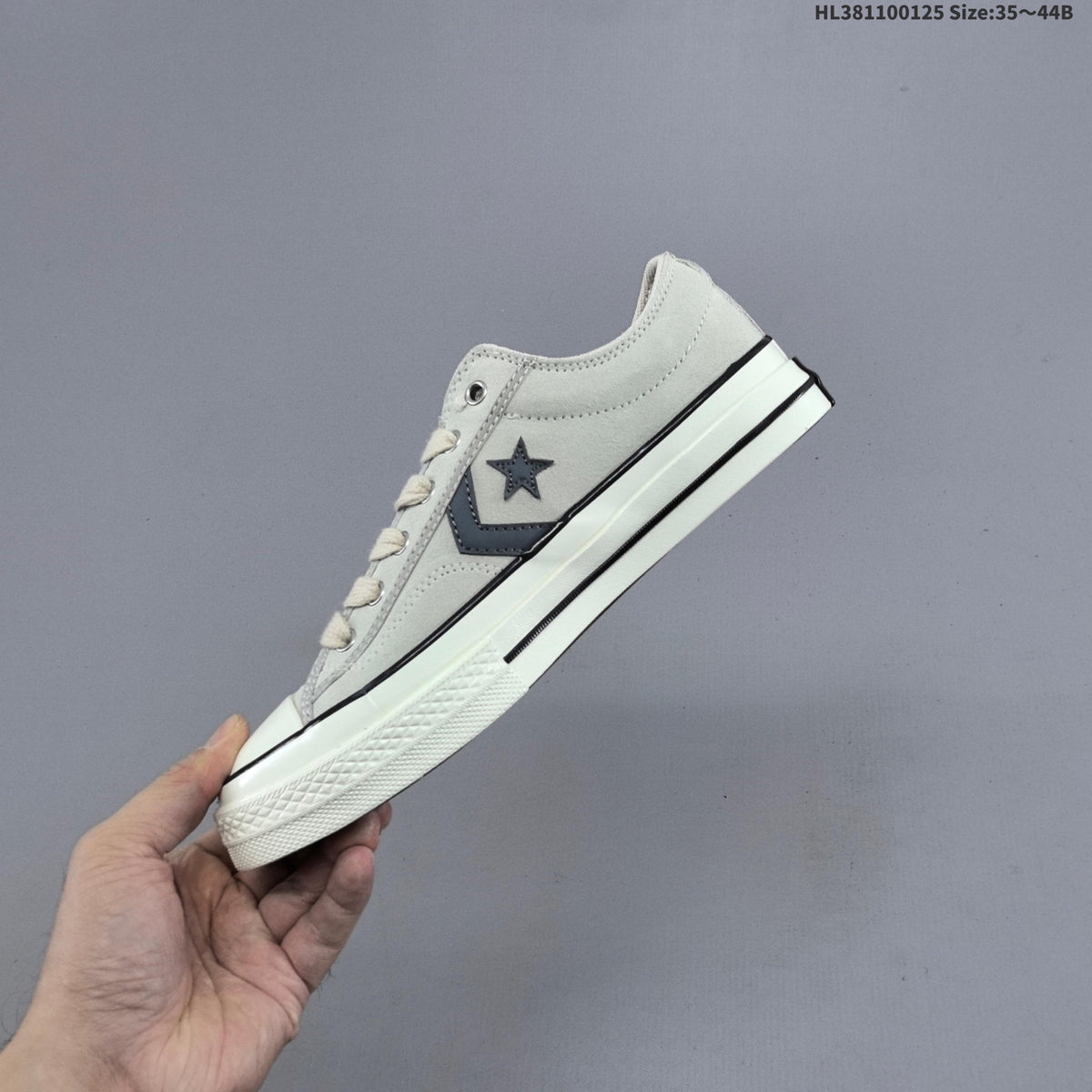 Converse Star Player Ox Low-Cut Sneakers in Navy/White - product image from the listing.