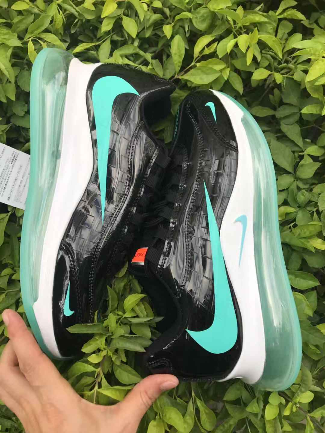Black and Turquoise Nike Air Max 720 Sneakers - product image from the listing.