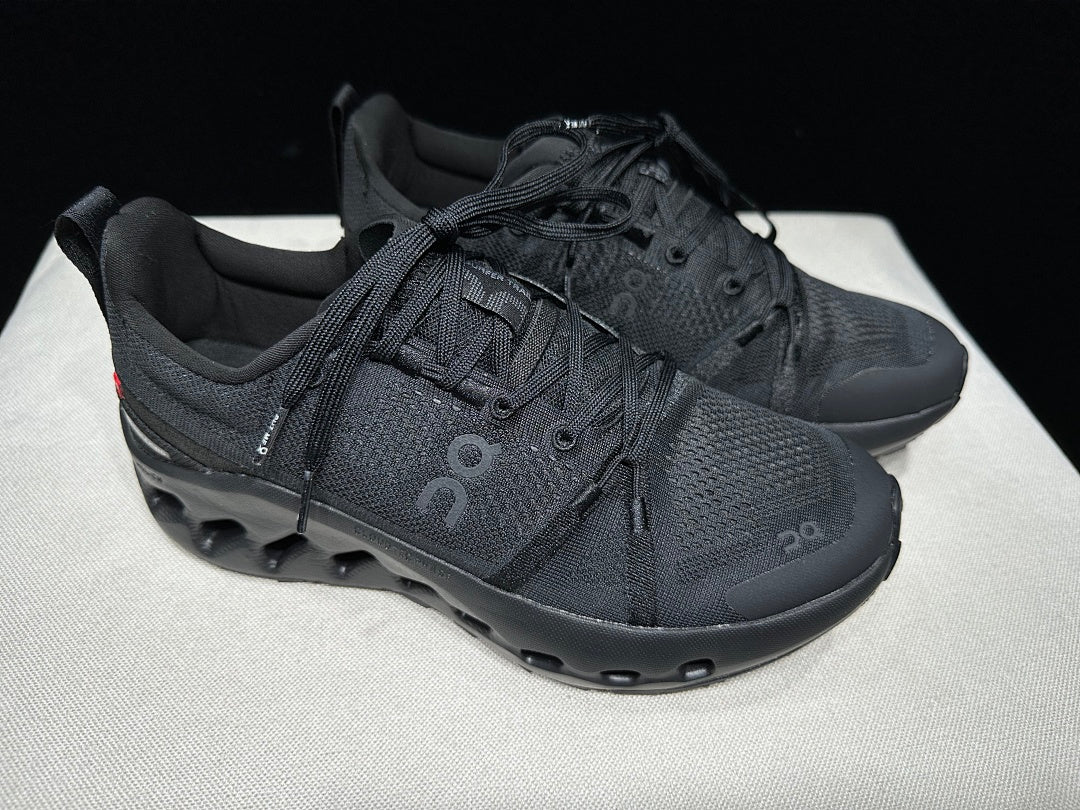 On Cloudsurfer Trail Trail Running Shoes in Black - product image from the listing.