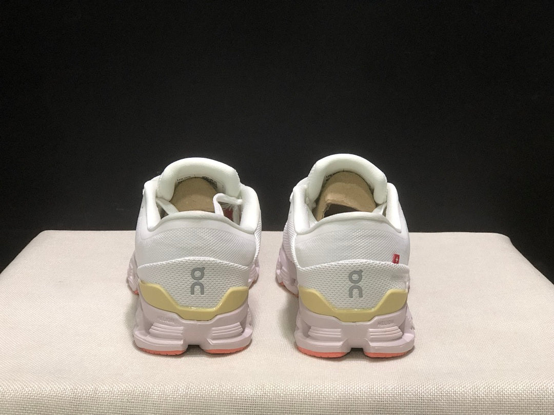 On Cloud X 4 Sneakers in White Yellow Pink - product image from the listing.