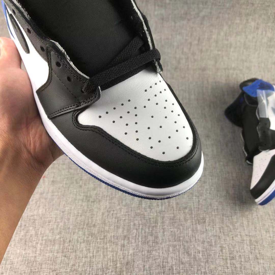 Jordan 1 Retro Fragment Sneakers in Black White Blue 716371-040 - product image from the listing.