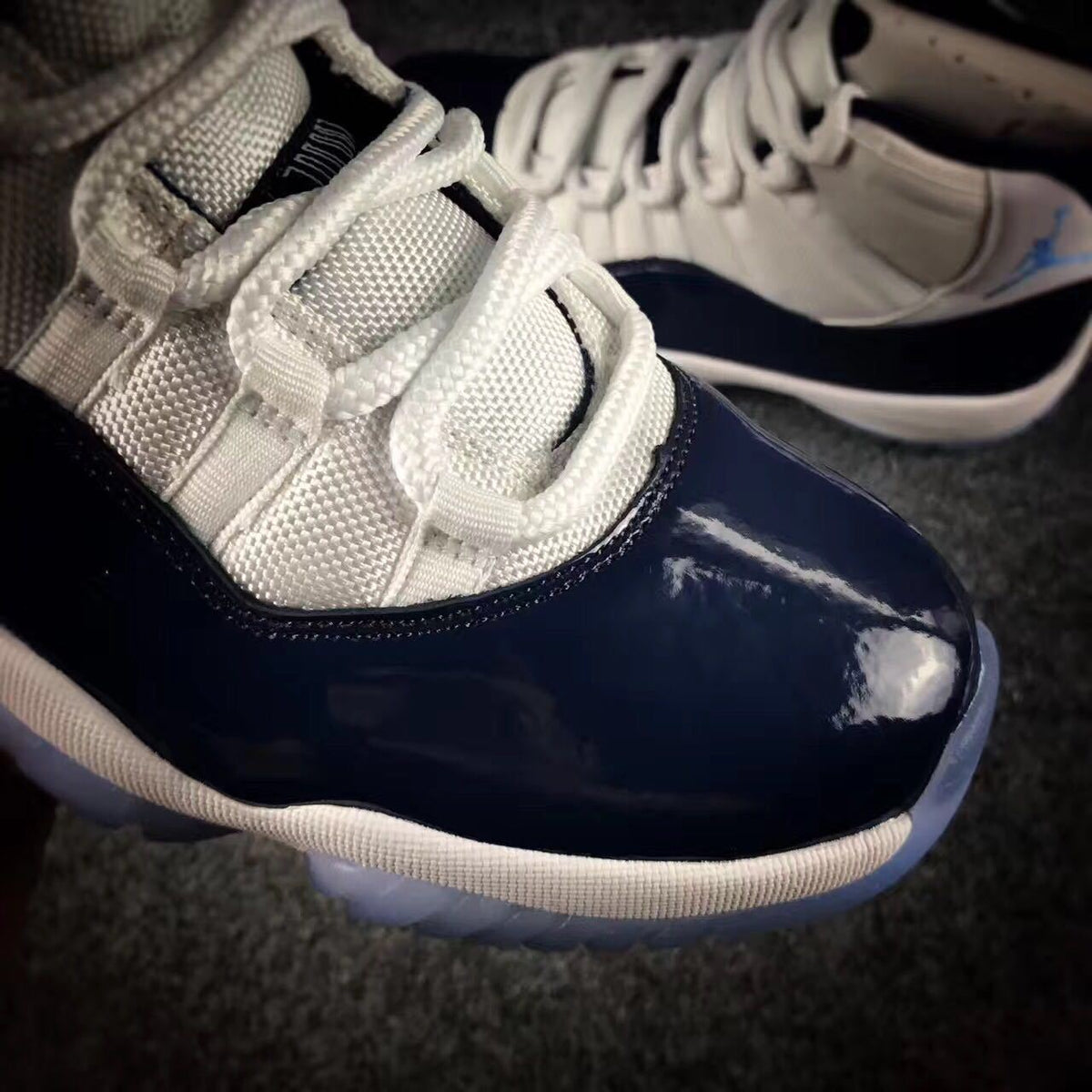 Jordan 11 Georgetown High-Top Sneakers in Navy - product image from the listing.